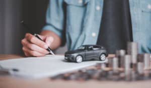 Autokauf Unterschrift, Miniaturauto